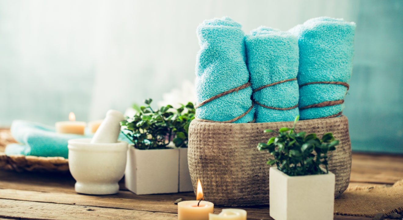 Entity has the scoop on how to arrange towels to make your home feel like a spa.