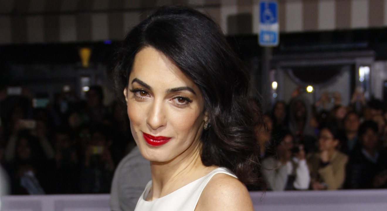 ENTITY reports Amal Clooney talking about women's diversity and her female role models.