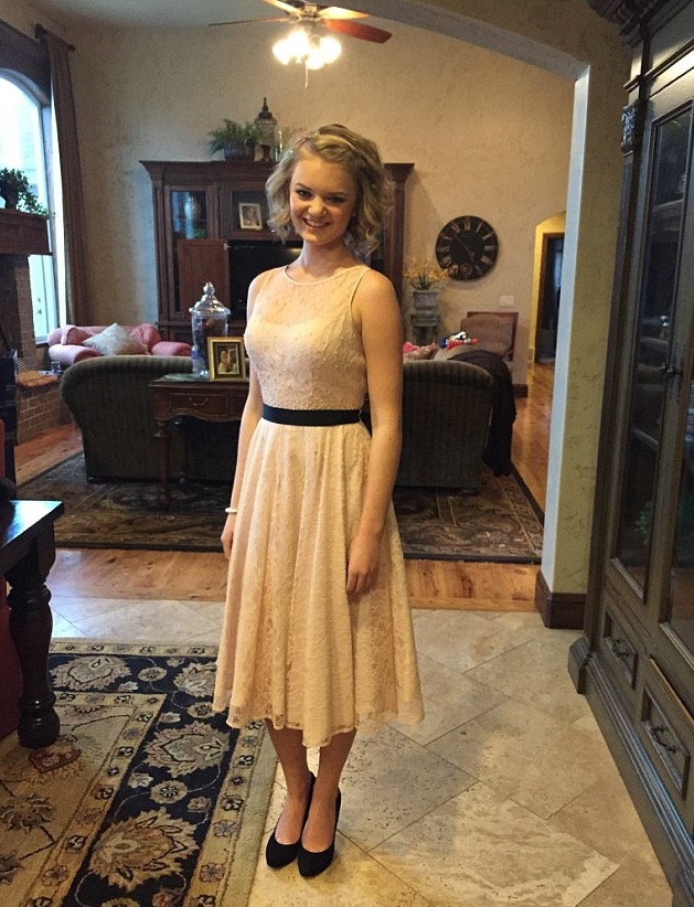 Entity reports on how Gabi Finlayson was embarrassed after being told this dress was “inappropriate” and made to wear a winter coat for an entire school dance.