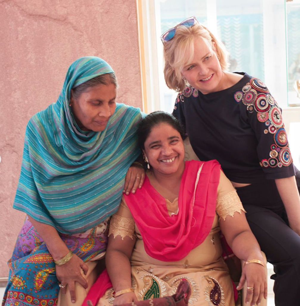 ENTITY reviews UNLEASHED's "Connecting Thread: Unleashing India" short. Picture of Kara Ross with Gudia Khan and her mother.