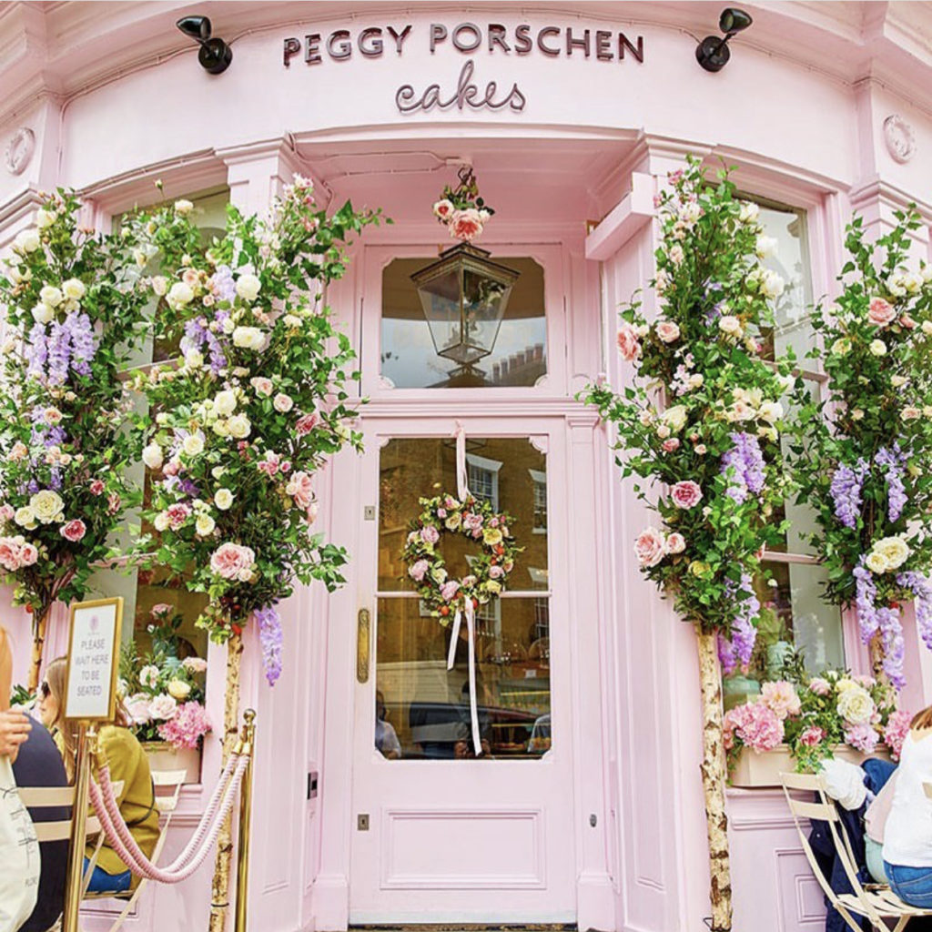 Entity shares photo of pink door at Peggy Porschen cakes 