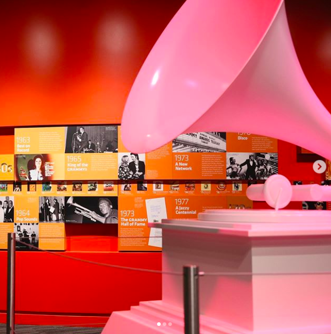 Entity shares photo of a photo of a large scale grammy award at the Grammy Museum