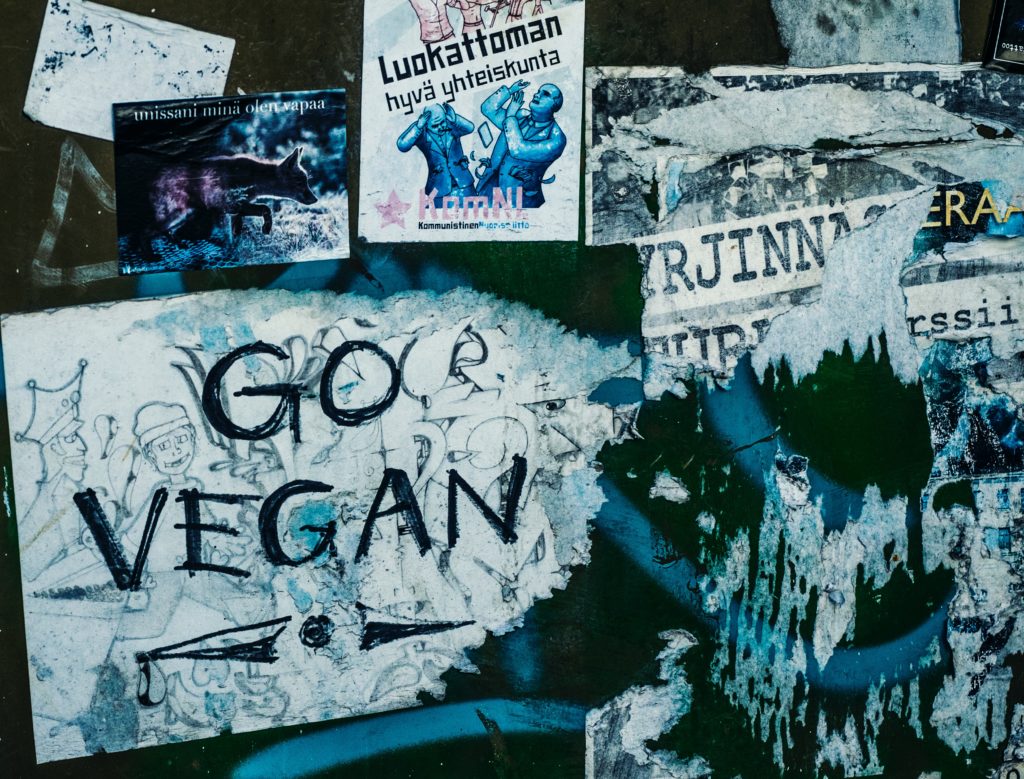 go vegan post on a wall 
