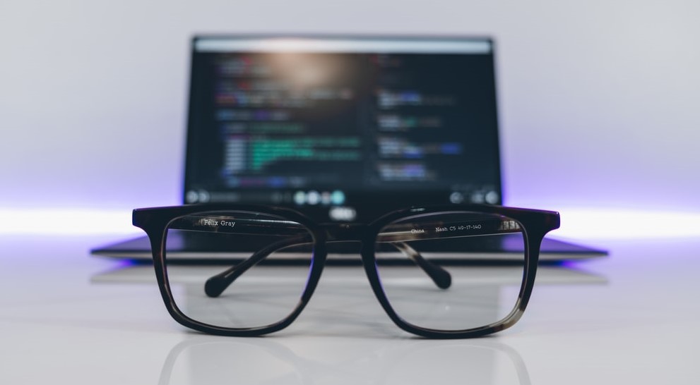 ENTITY Mag shares photo of glasses from Unsplash.