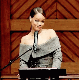 ENTITY Mag shares a gif of Rihanna flipping her ponytail and smiling. Rihanna mentions that the best way to counter negative thoughts and build your confidence is to fake it til you make it. 